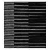 Black and gray striped rug on a white background